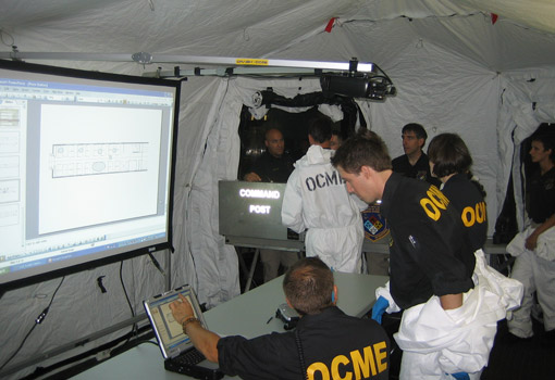 NYC OCME personnel respond inside a DRASH mobile command shelter during an August 25th multi-agency exercise at Penn Station.